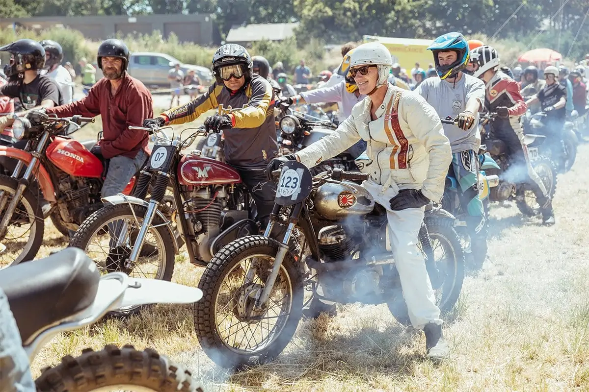 A group of motorcyclists in vintage style clothing