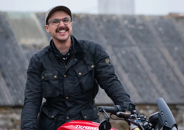 A smiling motorcyclist