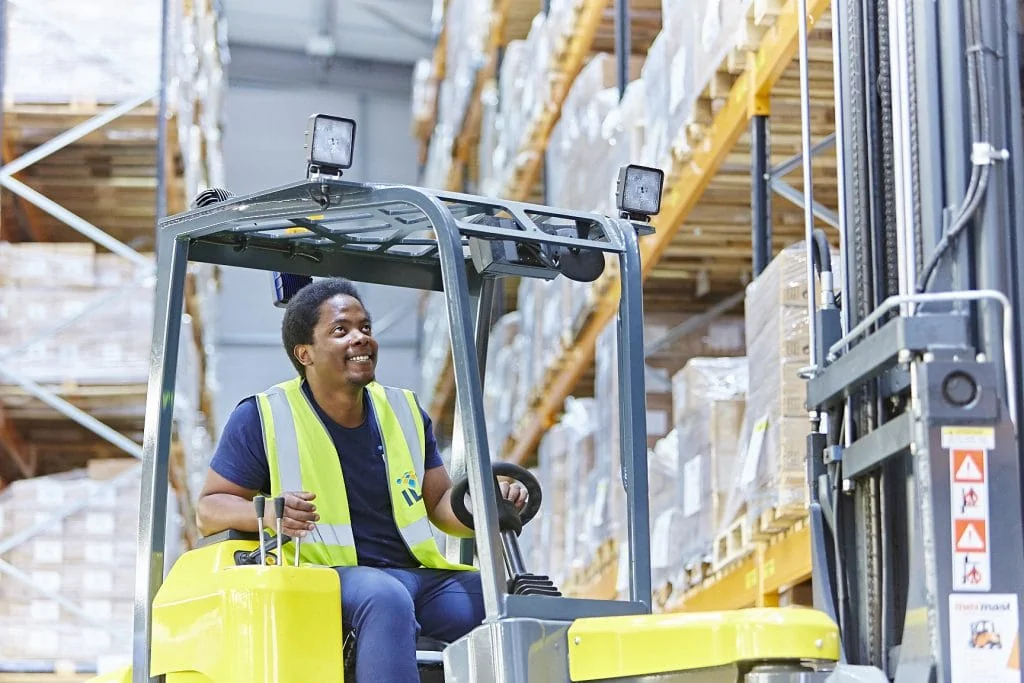 ILG warehouse employee operating a forklift