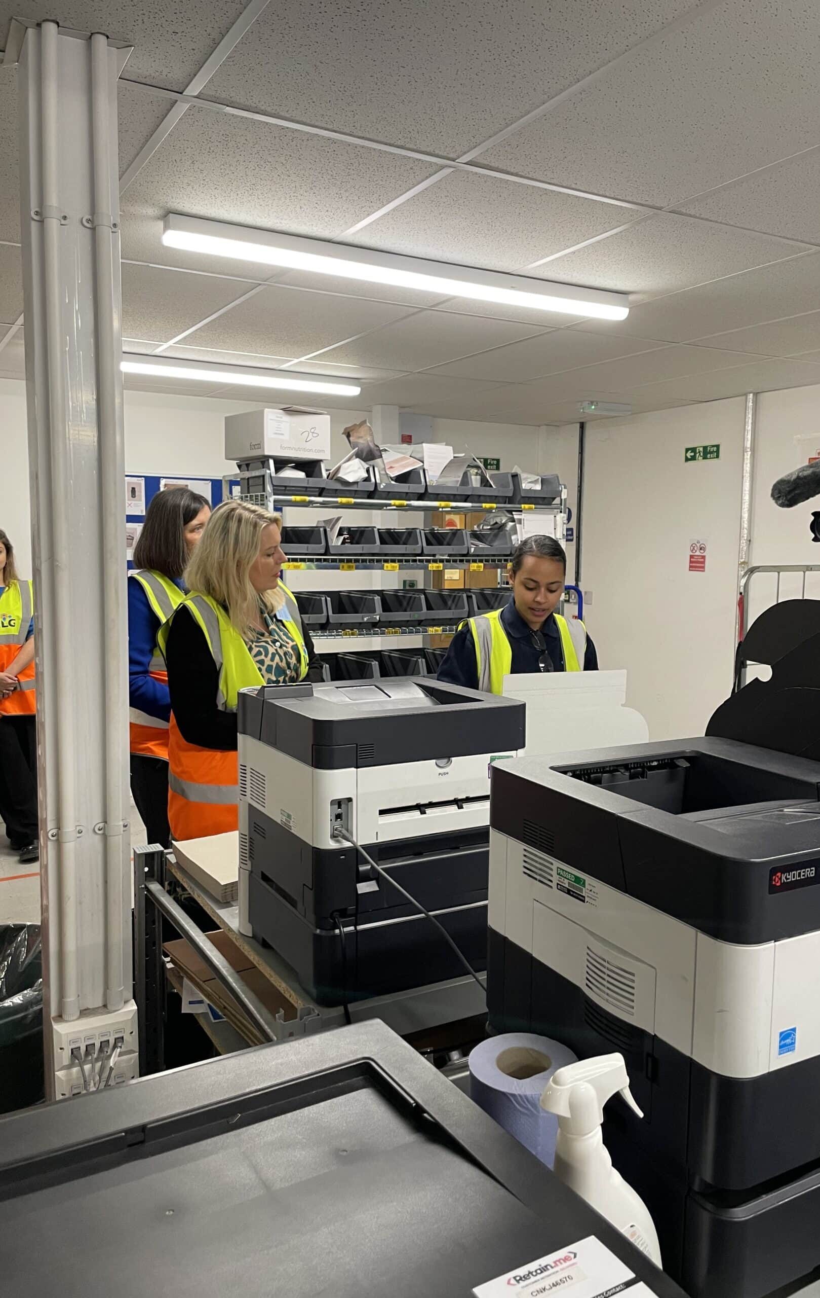 Junior ILG employees being shown around an office